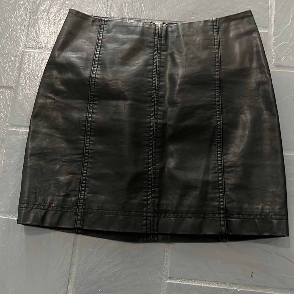 Free People faux leather skirt. Black. Size 2. Great condition. Never worn.